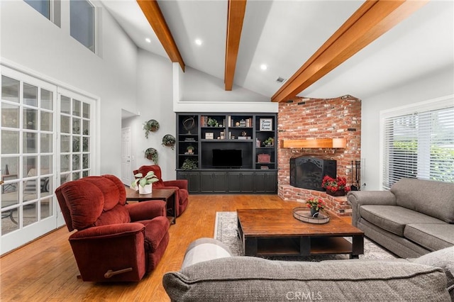 1270 Belle Rd, Calimesa, CA 92320 - living room featuring wood finished floors, a brick fireplace, and recessed lighting
