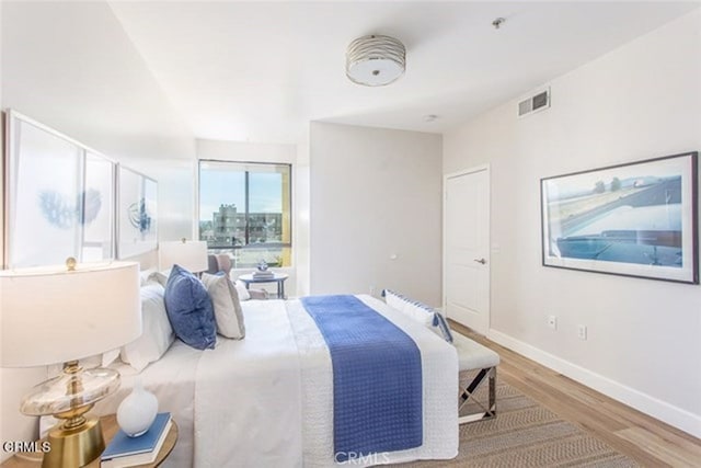 6938 Laurel Canyon Blvd Unit 214, North Hollywood, CA 91605 - bedroom with wood finished floors and baseboards