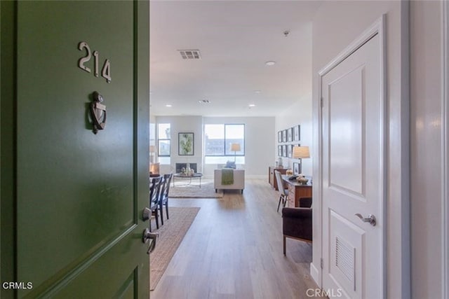 6938 Laurel Canyon Blvd Unit 214, North Hollywood, CA 91605 - corridor with wood finished floors and recessed lighting