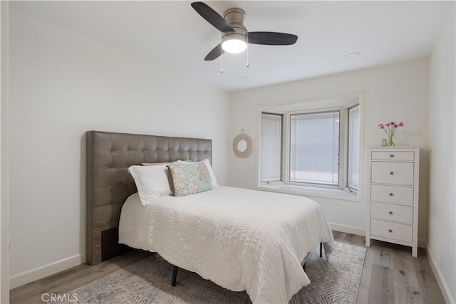 3812 Denwood Ave, Los Alamitos, CA 90720 - bedroom with wood finished floors, baseboards, and ceiling fan