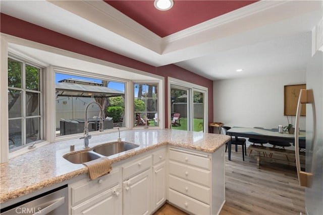 3812 Denwood Ave, Los Alamitos, CA 90720 - kitchen with a sink, dishwasher, white cabinetry, light stone counters, and recessed lighting