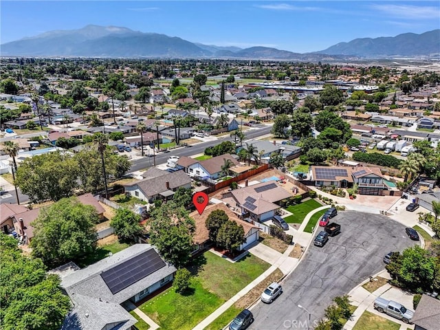 1264 N Mulberry Ave, Rialto, CA 92376 - aerial perspective of suburban area with a mountainous background