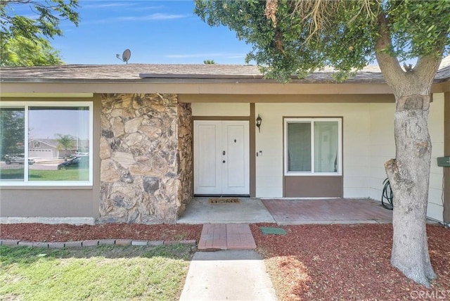 1264 N Mulberry Ave, Rialto, CA 92376 - entrance to property featuring stone siding and covered porch