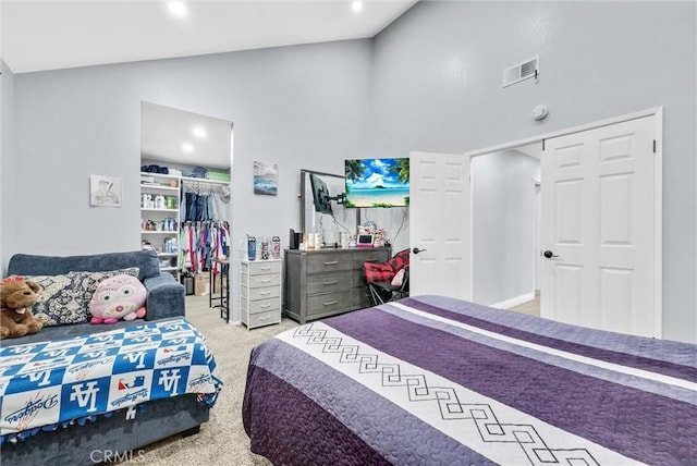 1264 N Mulberry Ave, Rialto, CA 92376 - bedroom featuring a closet, high vaulted ceiling, carpet flooring, and a walk in closet