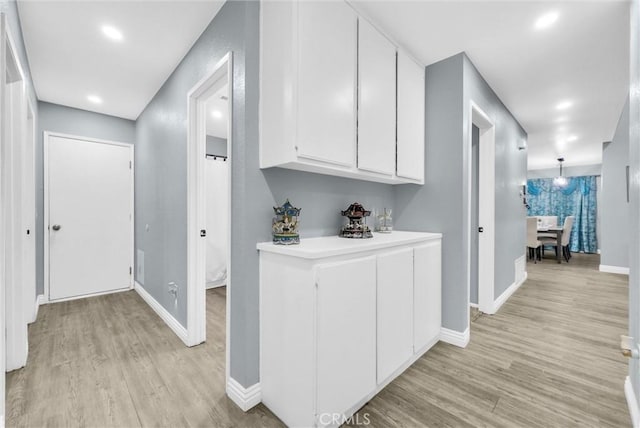 1264 N Mulberry Ave, Rialto, CA 92376 - hall with light wood-style floors and recessed lighting