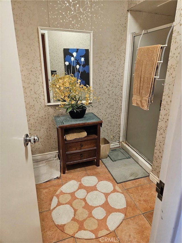 2620 2nd Ave Unit 5B, San Diego, CA 92103 - full bath featuring wallpapered walls, a stall shower, tile patterned flooring, and vanity