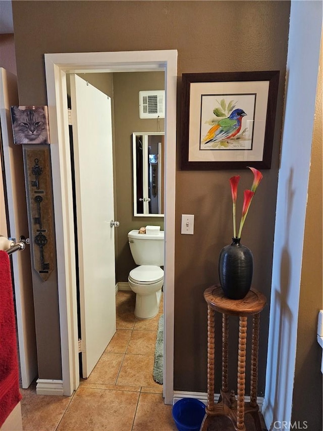 2620 2nd Ave Unit 5B, San Diego, CA 92103 - half bath with tile patterned floors, toilet, and baseboards