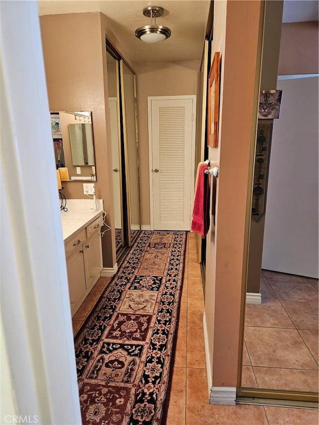 2620 2nd Ave Unit 5B, San Diego, CA 92103 - hall with light tile patterned floors