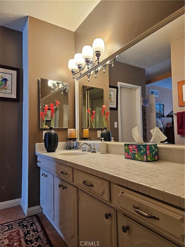 2620 2nd Ave Unit 5B, San Diego, CA 92103 - bathroom with vanity and baseboards