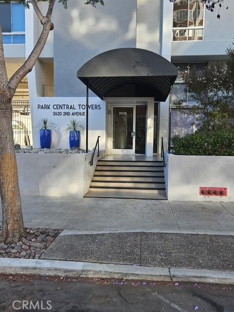 2620 2nd Ave Unit 5B, San Diego, CA 92103 - entrance to property with french doors and stucco siding