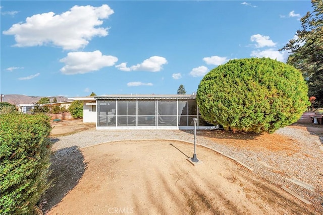 34473 Arbor Way, Yucaipa, CA 92399 - rear view of house with a sunroom