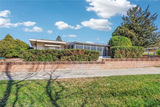 34473 Arbor Way, Yucaipa, CA 92399 - view of front of house with a sunroom and stucco siding