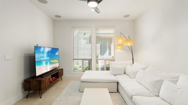 2510 Aperture Cir, San Diego, CA 92108 - living room with ceiling fan, plenty of natural light, baseboards, and light tile patterned flooring