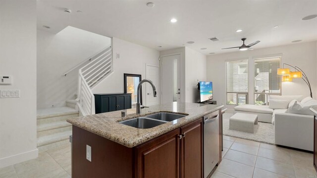 2510 Aperture Cir, San Diego, CA 92108 - kitchen featuring a sink, open floor plan, dishwasher, light tile patterned floors, and a center island with sink