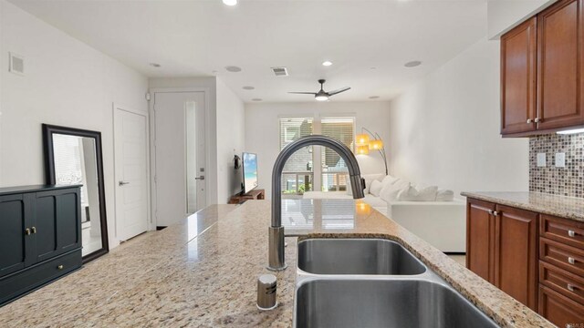 2510 Aperture Cir, San Diego, CA 92108 - kitchen with a sink, tasteful backsplash, ceiling fan, open floor plan, and recessed lighting