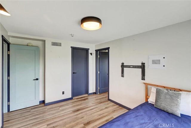 30396 Live Oak Dr, Running Springs, CA 92382 - unfurnished bedroom with light wood-style flooring and baseboards