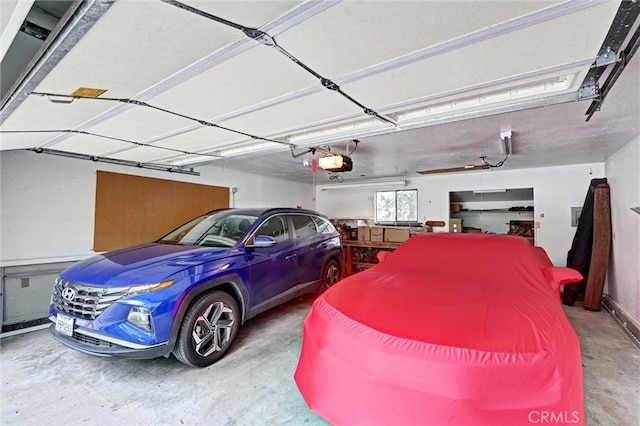 30396 Live Oak Dr, Running Springs, CA 92382 - garage with a garage door opener