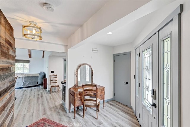 30396 Live Oak Dr, Running Springs, CA 92382 - foyer featuring a chandelier and light wood-style floors