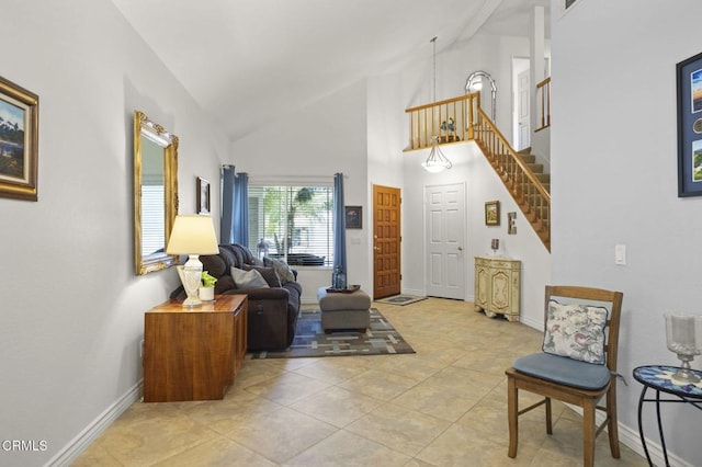 5084 Via Calderon, Camarillo, CA 93012 - living room with baseboards, stairway, high vaulted ceiling, and light tile patterned floors