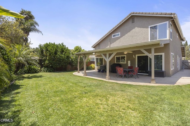 5084 Via Calderon, Camarillo, CA 93012 - back of property with a ceiling fan, stucco siding, and a patio area