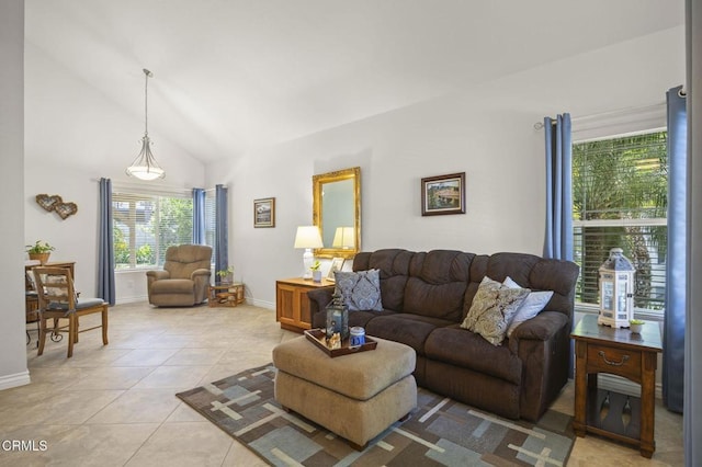 5084 Via Calderon, Camarillo, CA 93012 - living area with baseboards, light tile patterned floors, and high vaulted ceiling