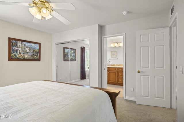 5084 Via Calderon, Camarillo, CA 93012 - bedroom featuring light carpet, a closet, ensuite bathroom, and a ceiling fan