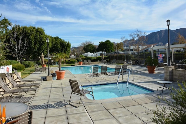 5084 Via Calderon, Camarillo, CA 93012 - community pool featuring a hot tub, a patio, and a mountain view