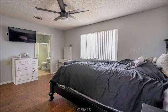 22780 Shawnee Rd, Apple Valley, CA 92308 - bedroom featuring wood-type flooring, a textured ceiling, connected bathroom, baseboards, and a ceiling fan