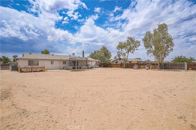 22780 Shawnee Rd, Apple Valley, CA 92308 - fenced backyard with a trampoline