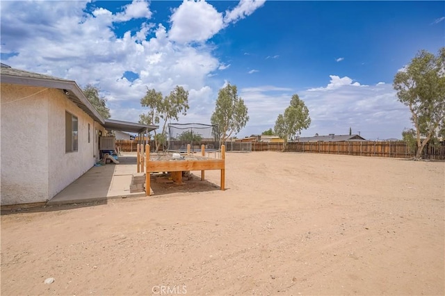 22780 Shawnee Rd, Apple Valley, CA 92308 - fenced backyard with a patio