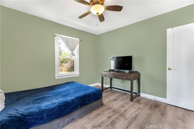 614 N Spring Ave, Compton, CA 90221 - bedroom featuring wood finished floors, baseboards, and ceiling fan
