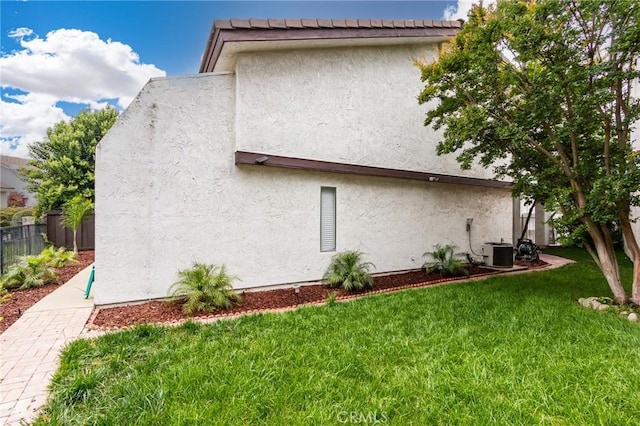 1320 Shadow Cir, Upland, CA 91784 - view of side of home with central AC and stucco siding