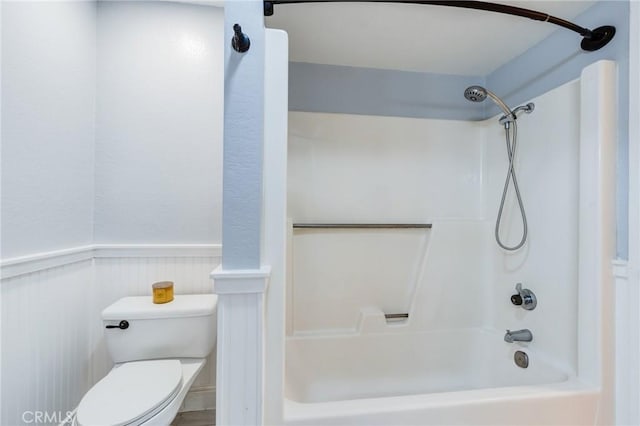 1320 Shadow Cir, Upland, CA 91784 - bathroom with toilet, tub / shower combination, and a wainscoted wall