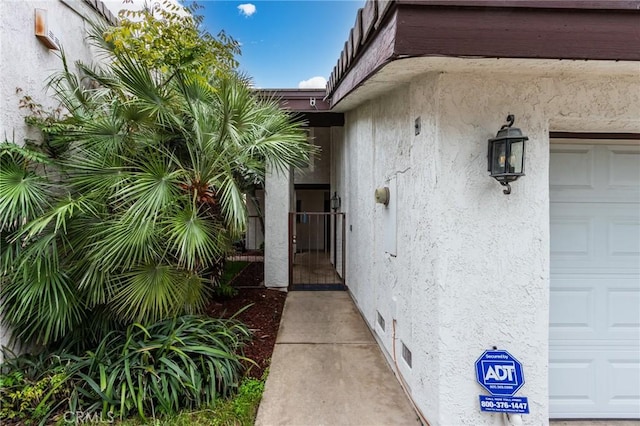 1320 Shadow Cir, Upland, CA 91784 - entrance to property with a garage and stucco siding
