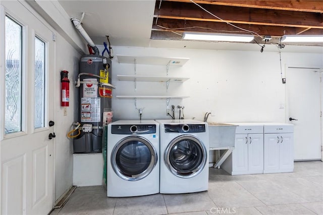 1320 Shadow Cir, Upland, CA 91784 - laundry area with washing machine and dryer, secured water heater, and light tile patterned floors