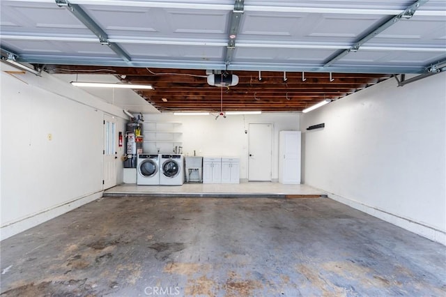 1320 Shadow Cir, Upland, CA 91784 - garage with washing machine and clothes dryer, a garage door opener, and secured water heater