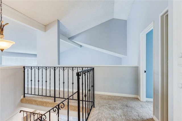 1320 Shadow Cir, Upland, CA 91784 - hallway featuring lofted ceiling, carpet floors, an upstairs landing, and baseboards
