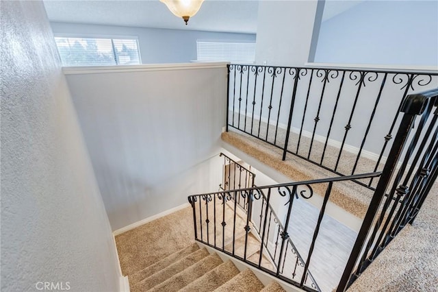 1320 Shadow Cir, Upland, CA 91784 - staircase with carpet floors and baseboards