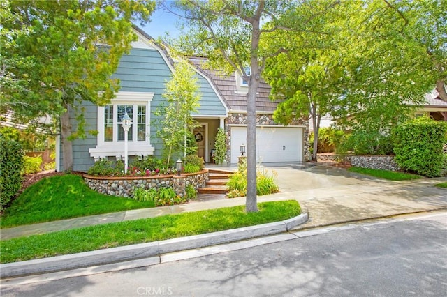 15 Beacon, Ladera Ranch, CA 92694 - view of property hidden behind natural elements featuring concrete driveway and a garage