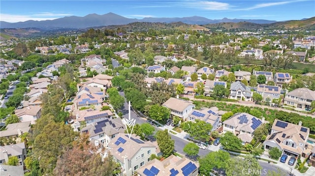 15 Beacon, Ladera Ranch, CA 92694 - aerial view of property and surrounding area featuring a mountainous background and nearby suburban area