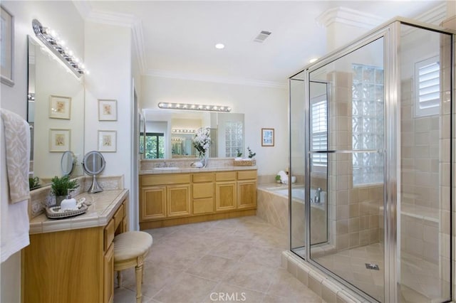 15 Beacon, Ladera Ranch, CA 92694 - bathroom with a shower stall, vanity, ornamental molding, a bath, and tile patterned flooring