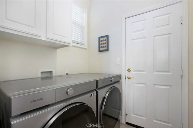 15 Beacon, Ladera Ranch, CA 92694 - laundry room with cabinet space and separate washer and dryer