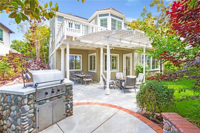 15 Beacon, Ladera Ranch, CA 92694 - back of property featuring outdoor dining space, a pergola, a patio area, and area for grilling