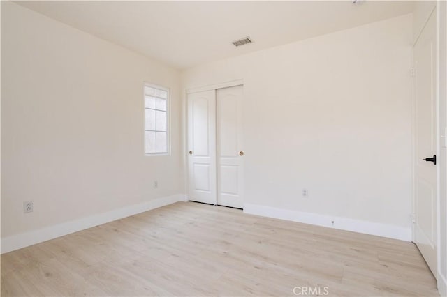 11451 Ghiberti Way, Porter Ranch, CA 91326 - spare room featuring light wood-style floors and baseboards