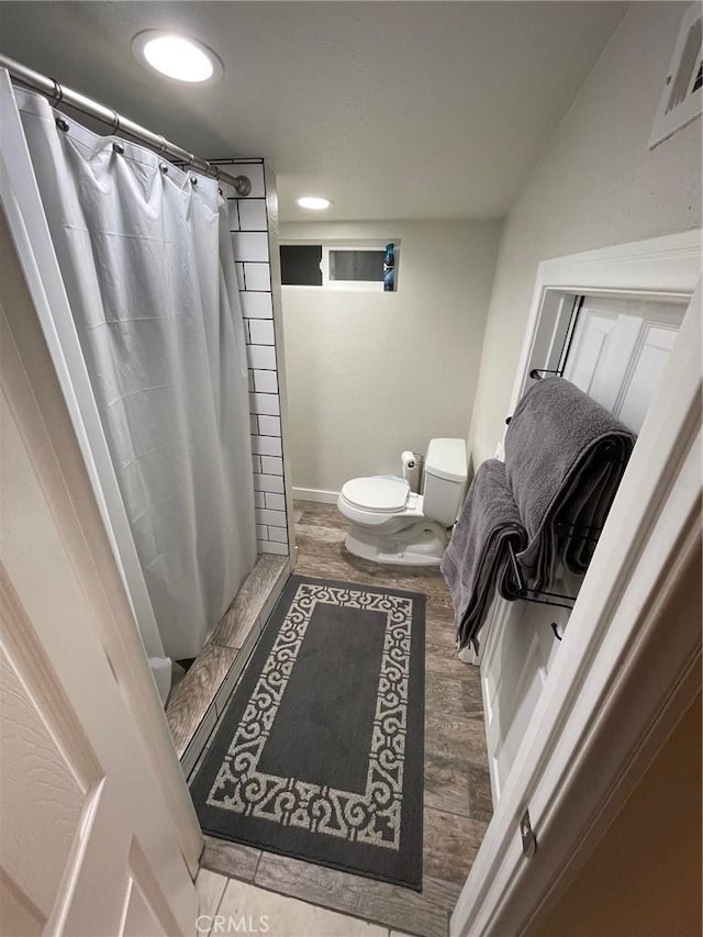 2557 Whispering Pines Dr, Running Springs, CA 92382 - bathroom featuring toilet, a stall shower, wood finished floors, and recessed lighting