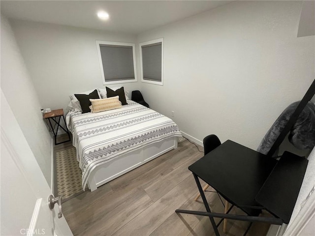 2557 Whispering Pines Dr, Running Springs, CA 92382 - bedroom with wood finished floors, baseboards, and recessed lighting