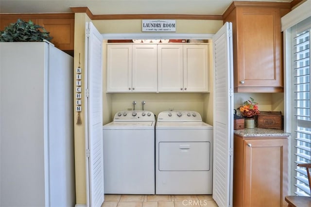 9793 Louise Way, Rancho Cucamonga, CA 91730 - washroom with cabinet space, washer and dryer, and light tile patterned flooring