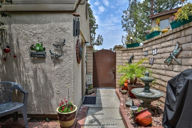9793 Louise Way, Rancho Cucamonga, CA 91730 - view of side of home featuring a gate and stucco siding