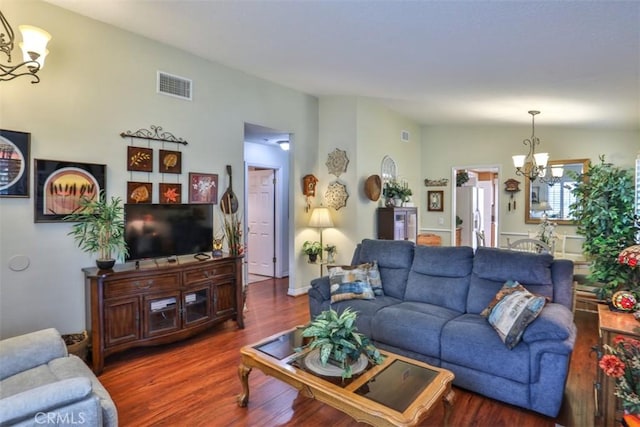 9793 Louise Way, Rancho Cucamonga, CA 91730 - living room with a chandelier and dark wood-style flooring
