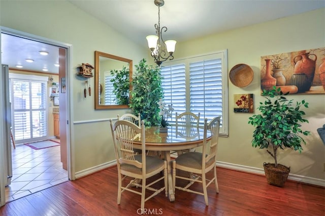 9793 Louise Way, Rancho Cucamonga, CA 91730 - dining space with wood finished floors, baseboards, and a chandelier